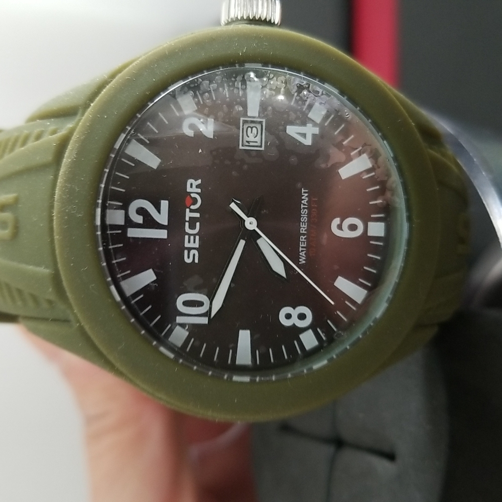 Sector men watch.  Rubber band in green  New with original tag and box.